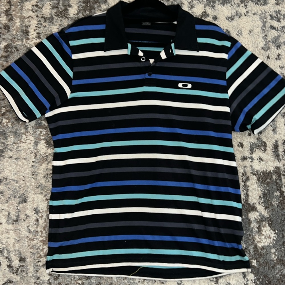 Oakley collar shirt! Excellent condition. No stains or tears.